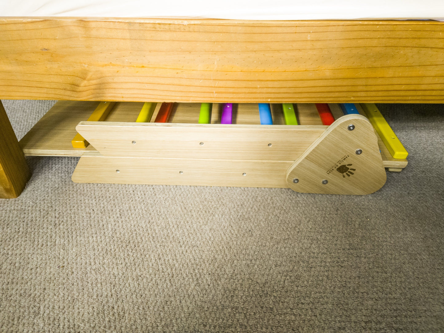 toddler climbing frame been stored under a bed as it has a foldable frame