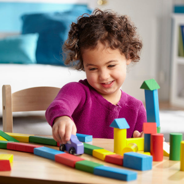 wooden building blocks and trolley